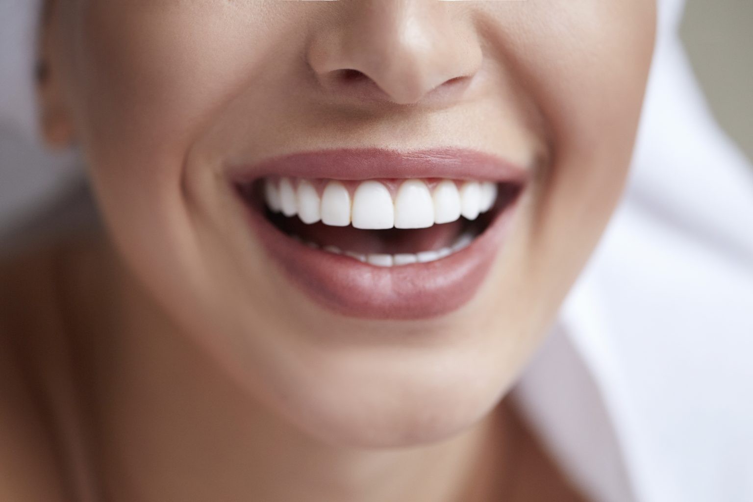 Healthy White Smile Close Up. Beauty Woman With Perfect Smile, Lips And Teeth. Beautiful Girl With Perfect Skin. Teeth Whitening